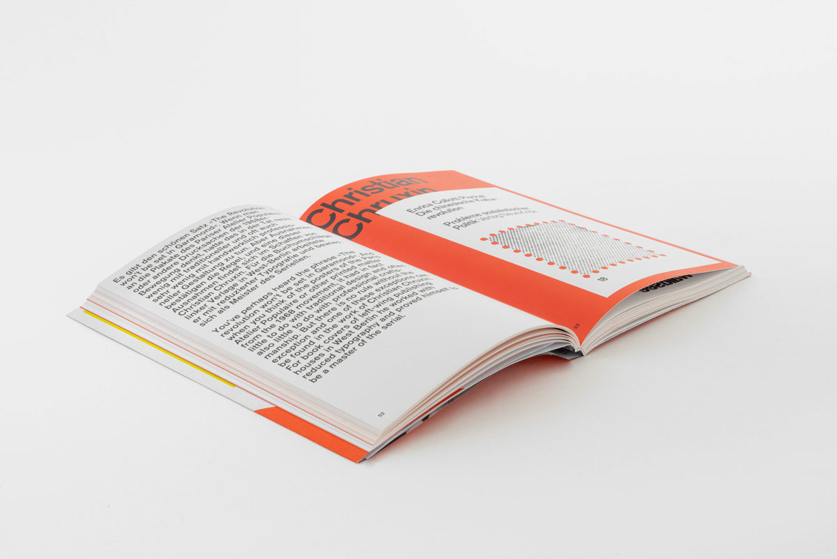 A5/09 West-Berlin Grafik-Design – the book open at an angle, chapter on Christian Chruxin with an orange header